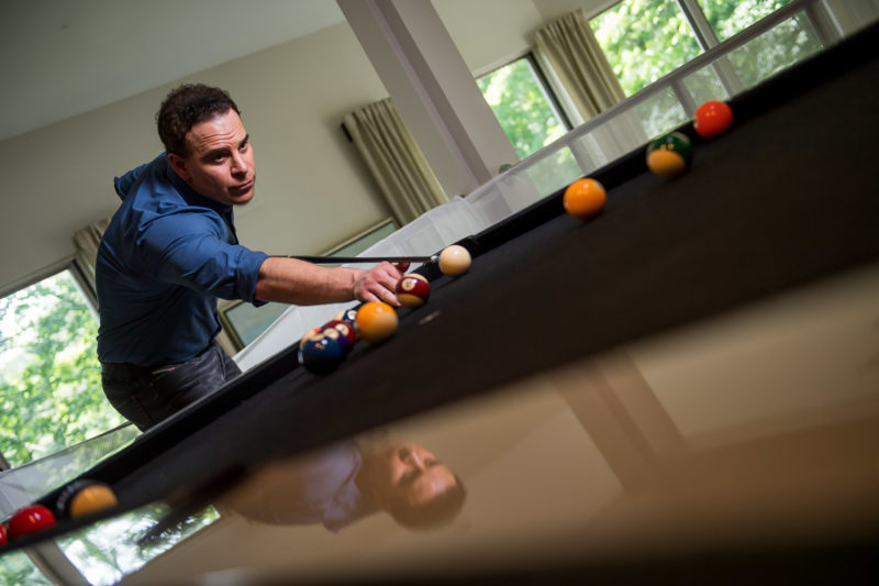 NYC Branded Lifestyle Portrait Dr. Brain Lima playing pool